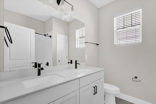 2311 Bear Peak Rd, Clermont, FL 34715 - bathroom featuring double vanity and a shower