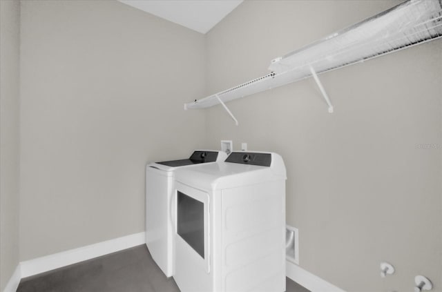 2311 Bear Peak Rd, Clermont, FL 34715 - laundry area featuring washer and dryer and baseboards