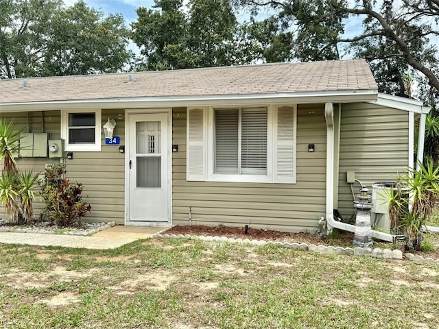 10301 US Highway 27 Unit 34, Clermont, FL 34711 - bungalow-style home with a shingled roof
