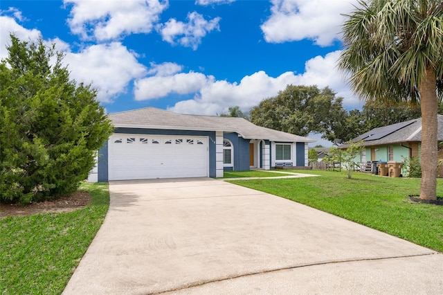 1115 Marni Ridge Ct, Kissimmee, FL 34747 - view of front facade with concrete driveway, stucco siding, a garage, and a front yard