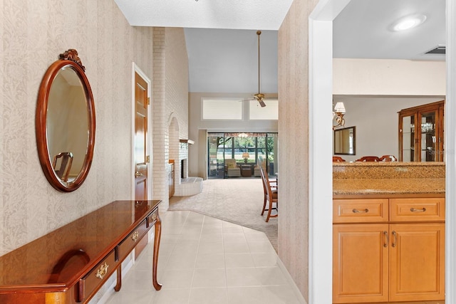 154 Golf Club Dr Unit 154, Longwood, FL 32779 - corridor with wallpapered walls, carpet, and tile patterned flooring