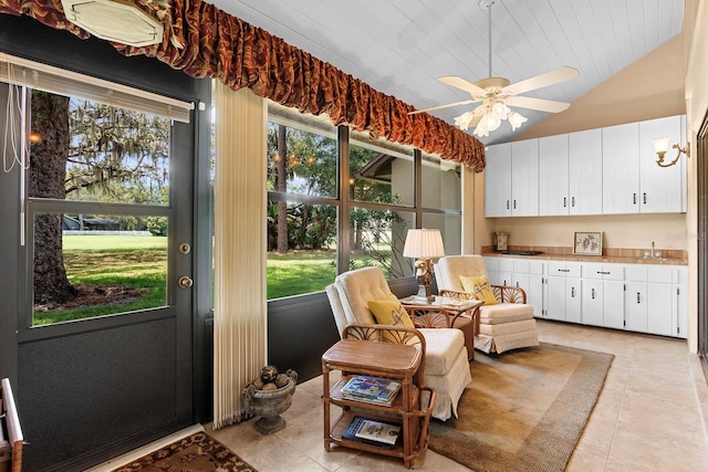 154 Golf Club Dr Unit 154, Longwood, FL 32779 - living area featuring light tile patterned floors, lofted ceiling, and ceiling fan