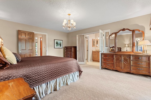 154 Golf Club Dr Unit 154, Longwood, FL 32779 - bedroom with light carpet, a chandelier, ensuite bath, and a textured ceiling