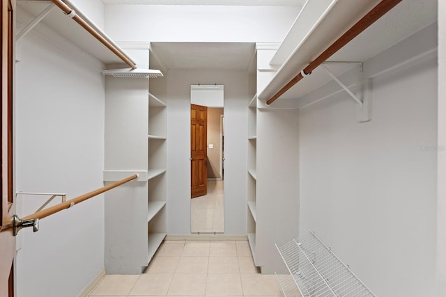 154 Golf Club Dr Unit 154, Longwood, FL 32779 - walk in closet with light tile patterned flooring