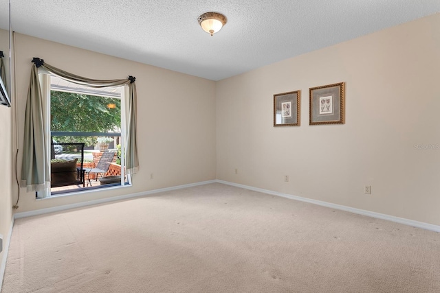 154 Golf Club Dr Unit 154, Longwood, FL 32779 - spare room featuring carpet and a textured ceiling