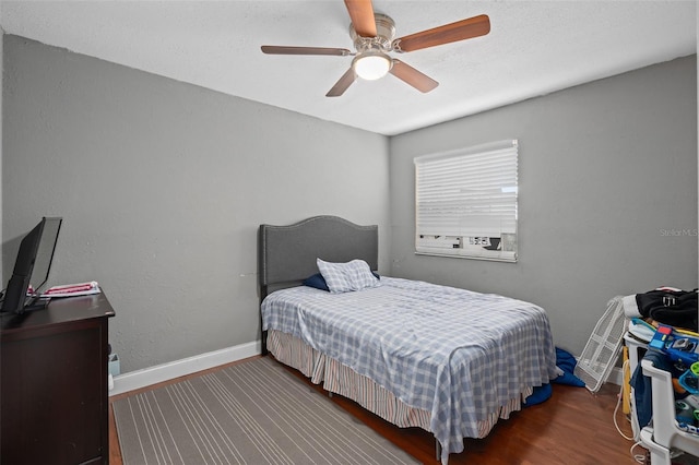 214 Majors Ln Unit B, Kissimmee, FL 34743 - bedroom featuring wood finished floors, baseboards, and ceiling fan