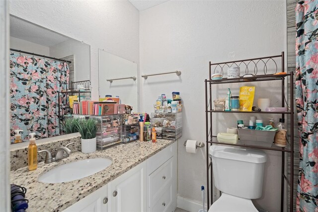 214 Majors Ln Unit B, Kissimmee, FL 34743 - bathroom featuring vanity, toilet, and curtained shower