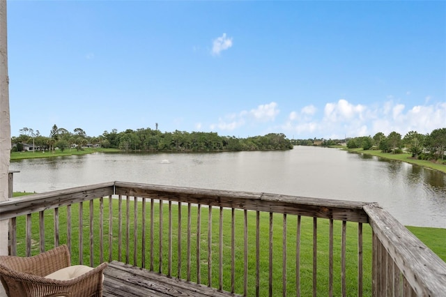214 Majors Ln Unit B, Kissimmee, FL 34743 - wooden deck with a water view and a yard