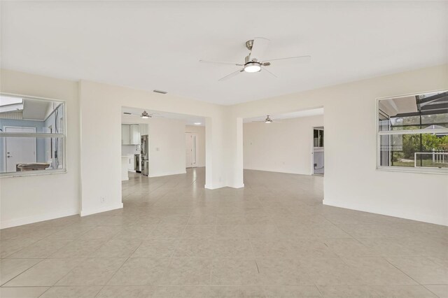 1764 Boca Raton Ct, Punta Gorda, FL 33950 - unfurnished room with ceiling fan and light tile patterned floors