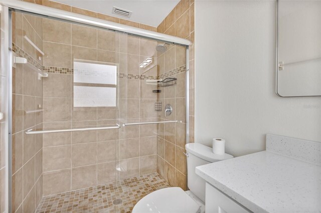 1764 Boca Raton Ct, Punta Gorda, FL 33950 - bathroom featuring vanity, toilet, and a stall shower