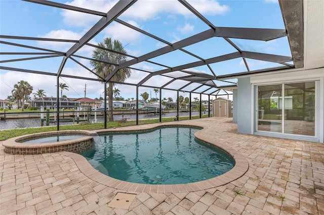 1764 Boca Raton Ct, Punta Gorda, FL 33950 - view of pool with a patio, a water view, and a pool with connected hot tub