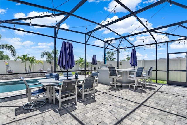 2390 Standing Rock Cir, Oakland, FL 34787 - fenced backyard with a patio and a lanai