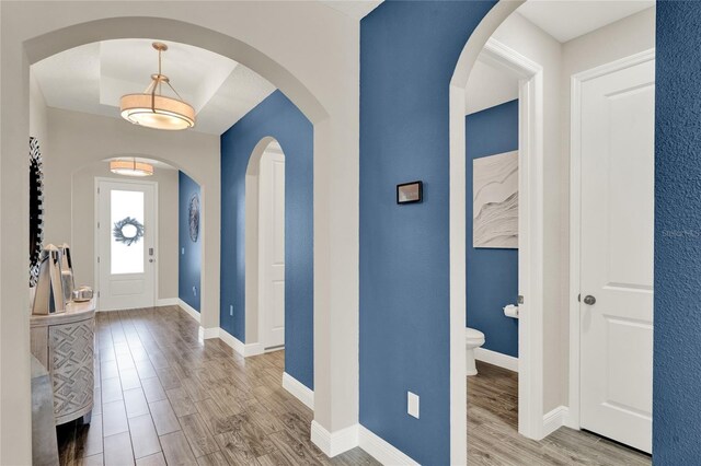 2390 Standing Rock Cir, Oakland, FL 34787 - foyer featuring wood finished floors and baseboards