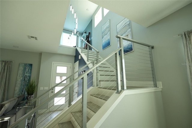2035 White Feather Loop, Oakland, FL 34787 - stairs featuring a high ceiling