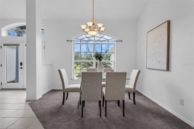 15038 Willow Ln, Tavares, FL 32778 - carpeted dining area featuring a chandelier and tile patterned flooring