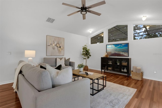 15038 Willow Ln, Tavares, FL 32778 - living room featuring lofted ceiling, a ceiling fan, and wood finished floors