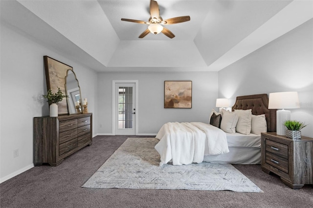 15038 Willow Ln, Tavares, FL 32778 - bedroom with a tray ceiling, carpet floors, and a ceiling fan