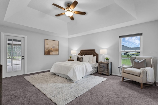 15038 Willow Ln, Tavares, FL 32778 - carpeted bedroom with a raised ceiling, multiple windows, and access to outside