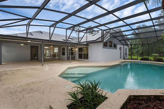 15038 Willow Ln, Tavares, FL 32778 - outdoor pool featuring a patio, ceiling fan, and a lanai