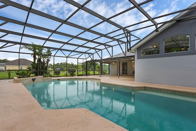 15038 Willow Ln, Tavares, FL 32778 - outdoor pool featuring a patio and glass enclosure