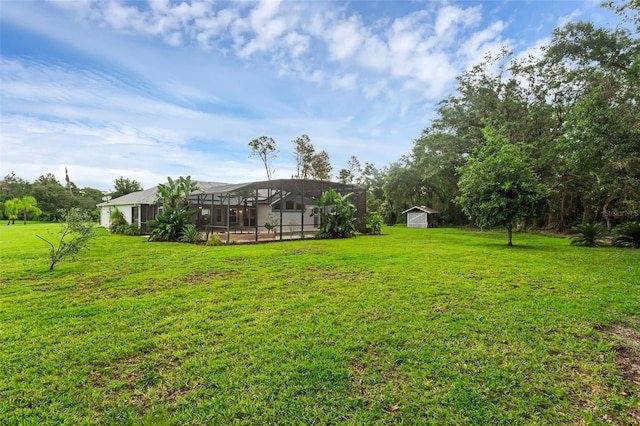 15038 Willow Ln, Tavares, FL 32778 - view of grassy yard featuring a shed and glass enclosure
