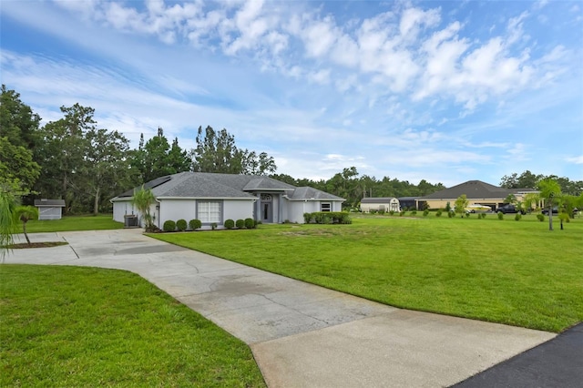 15038 Willow Ln, Tavares, FL 32778 - ranch-style home featuring concrete driveway and a front yard