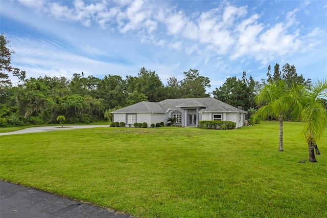 15038 Willow Ln, Tavares, FL 32778 - single story home featuring driveway and a front yard