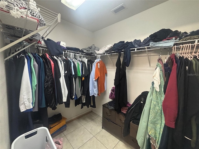 11236 Rouse Run Cir, Orlando, FL 32817 - spacious closet featuring tile patterned floors