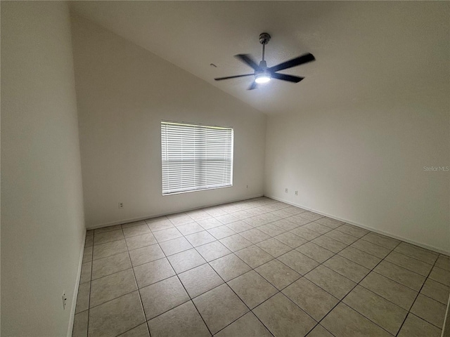 11236 Rouse Run Cir, Orlando, FL 32817 - spare room with vaulted ceiling, light tile patterned floors, and a ceiling fan