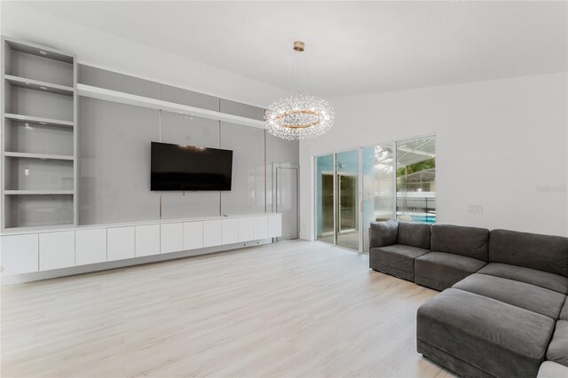 10001 Newington Dr, Orlando, FL 32836 - living area with wood finished floors and a chandelier