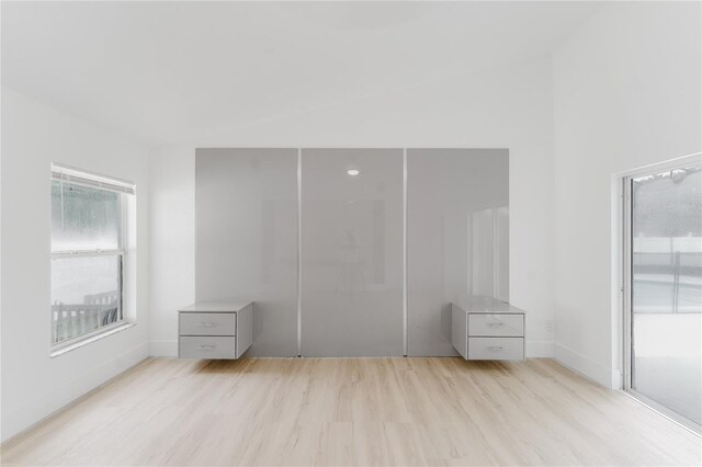 10001 Newington Dr, Orlando, FL 32836 - unfurnished bedroom featuring light wood-type flooring and baseboards