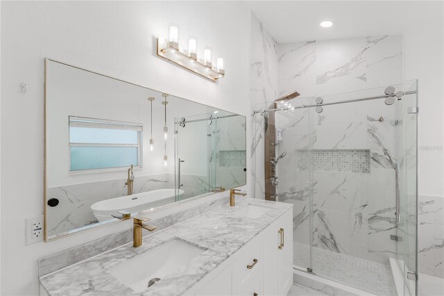 10001 Newington Dr, Orlando, FL 32836 - full bath with a marble finish shower, double vanity, and recessed lighting