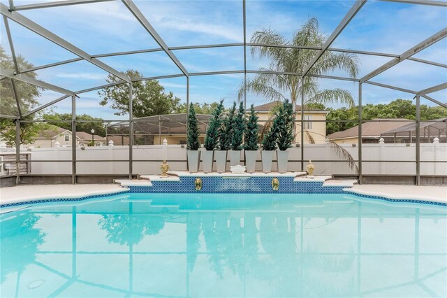 10001 Newington Dr, Orlando, FL 32836 - view of pool featuring glass enclosure