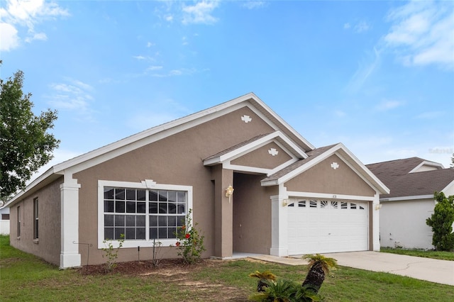 631 Lady Diana Dr, Davenport, FL 33837 - single story home featuring stucco siding, a garage, and driveway