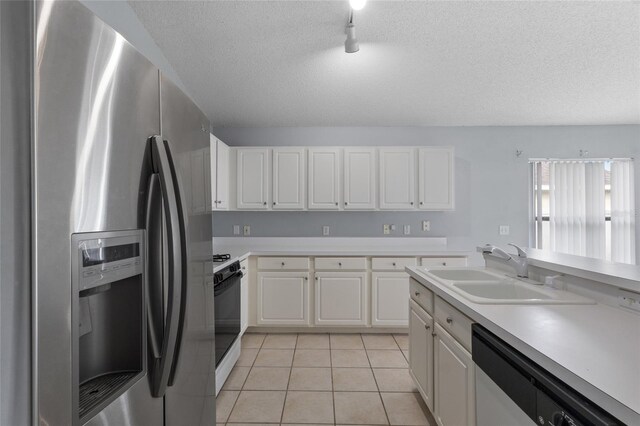 631 Lady Diana Dr, Davenport, FL 33837 - kitchen with stainless steel refrigerator with ice dispenser, dishwashing machine, white gas stove, light countertops, and a sink