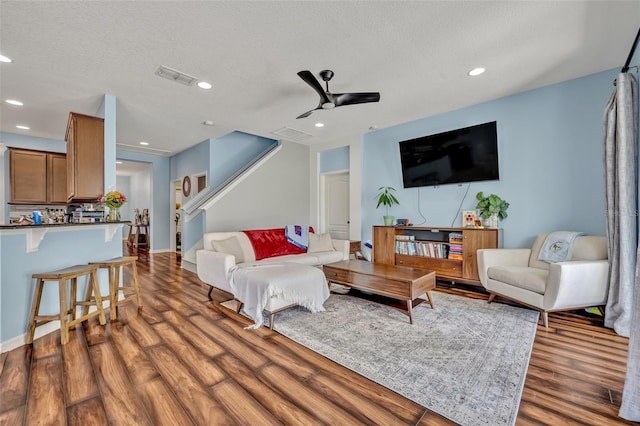 11616 Thacker Dr, Clermont, FL 34711 - living area with wood finished floors, recessed lighting, a textured ceiling, and ceiling fan