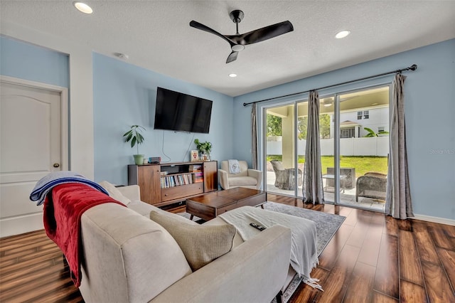11616 Thacker Dr, Clermont, FL 34711 - living area with ceiling fan, a textured ceiling, wood finished floors, and recessed lighting
