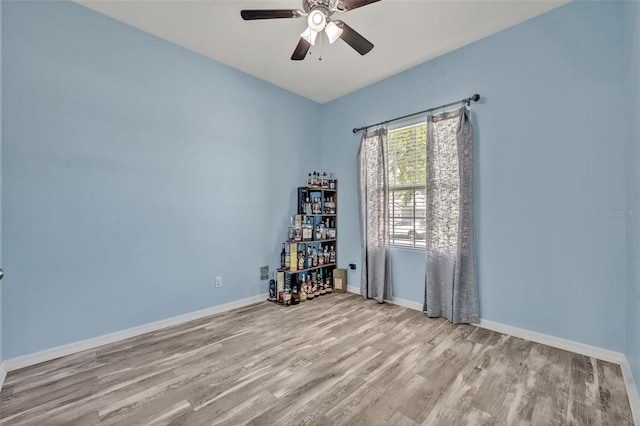 11616 Thacker Dr, Clermont, FL 34711 - empty room with ceiling fan and wood finished floors