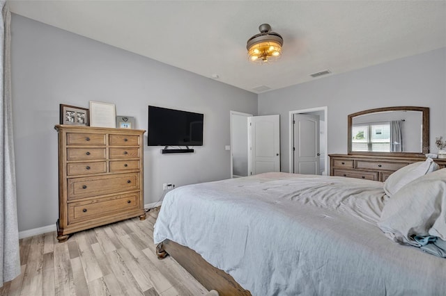 11616 Thacker Dr, Clermont, FL 34711 - bedroom with light wood-type flooring and baseboards