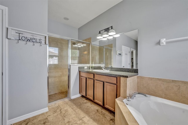 11616 Thacker Dr, Clermont, FL 34711 - bathroom featuring a stall shower, a garden tub, and vanity