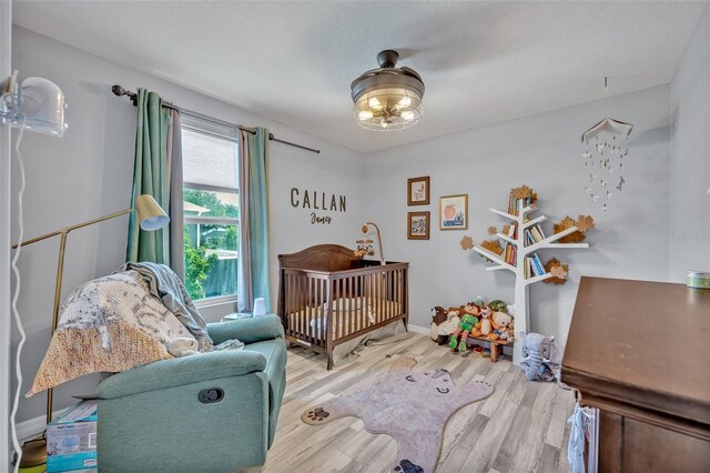 11616 Thacker Dr, Clermont, FL 34711 - bedroom with wood finished floors and baseboards