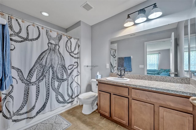 11616 Thacker Dr, Clermont, FL 34711 - ensuite bathroom with vanity, tile patterned floors, and shower / tub combo with curtain