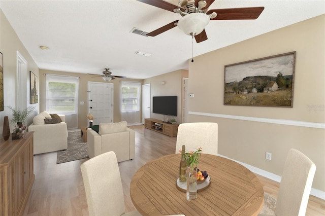 191 Ruskin St, Lake Mary, FL 32746 - dining space with a ceiling fan and light wood-style floors