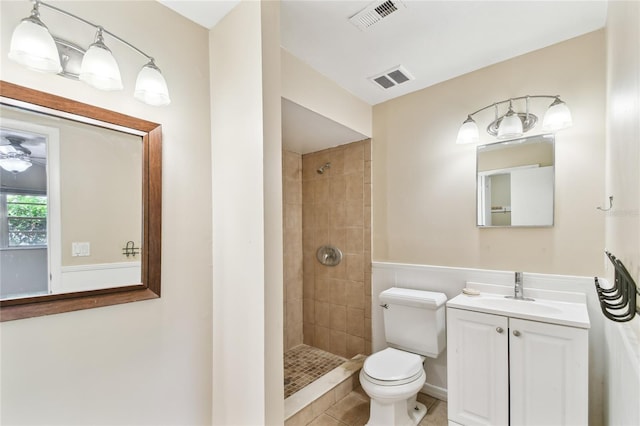 191 Ruskin St, Lake Mary, FL 32746 - bathroom with vanity, tiled shower, and tile patterned flooring
