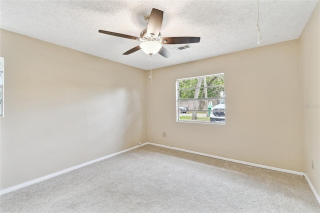 191 Ruskin St, Lake Mary, FL 32746 - carpeted spare room featuring a textured ceiling and a ceiling fan