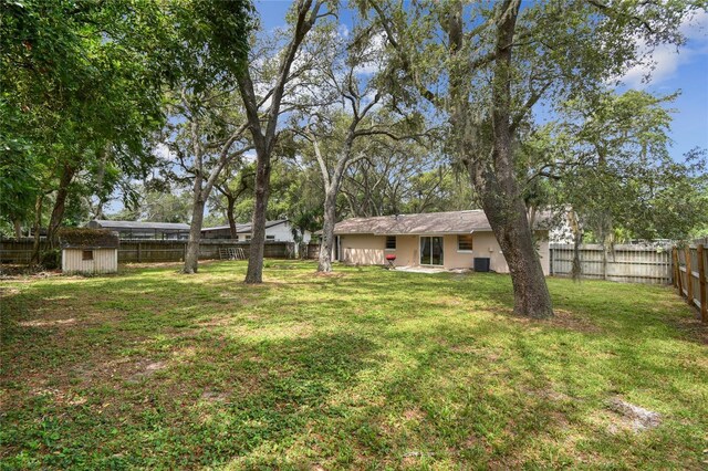 191 Ruskin St, Lake Mary, FL 32746 - fenced backyard featuring a shed