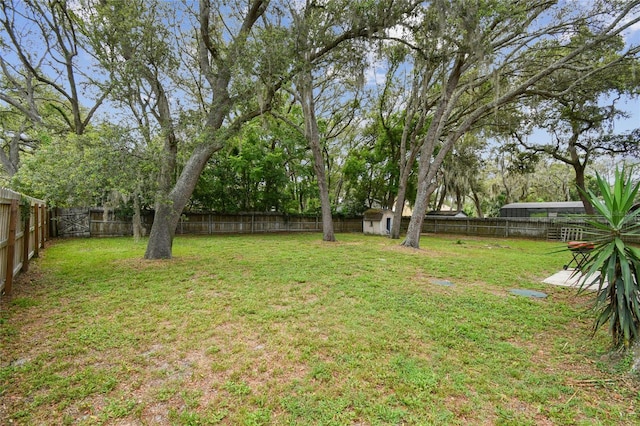 191 Ruskin St, Lake Mary, FL 32746 - fenced backyard featuring a storage unit