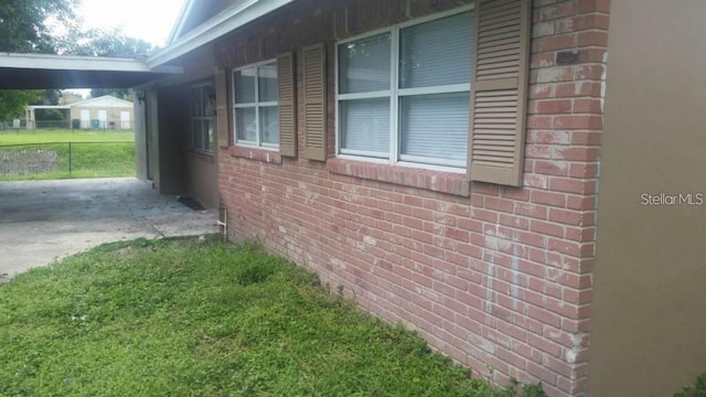 2260 Willie Mays Pkwy, Orlando, FL 32811 - view of side of home with brick siding