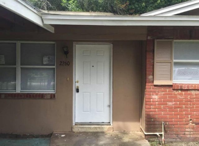 2260 Willie Mays Pkwy, Orlando, FL 32811 - property entrance featuring brick siding