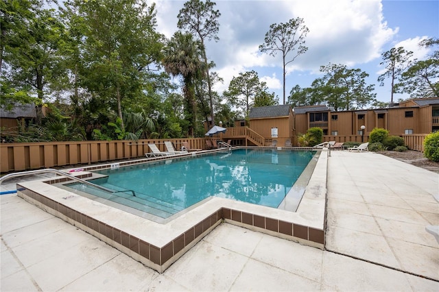 211 Crown Oaks Way Unit 205, Longwood, FL 32779 - community pool featuring a patio area